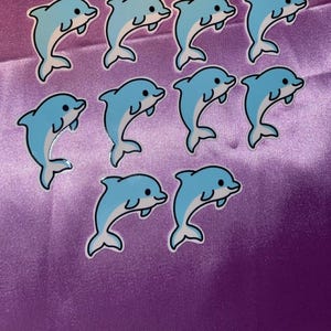 Bezaubernde Delfin Cabochons mit flacher Rückseite