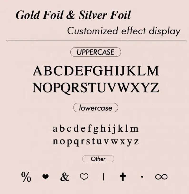 May include: A light pink background displays a font chart with uppercase, lowercase, and other symbols. The text at the top reads "Gold Foil & Silver Foil" and "Customized effect display". The uppercase letters are in a serif font.