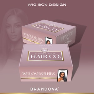 May include: A pink box with the text "Diamond Renai Hair Co." in gold lettering. The box features a picture of a woman with long, straight hair on the front. The text "We Love Selfies" is also on the front of the box.