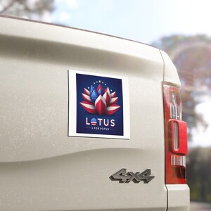 May include: A square car magnet with a blue background and a red, white, and blue lotus flower design. The text "LOTUS FOR POTUS" is printed below the flower.