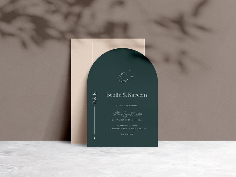 May include: A dark green wedding invitation with a crescent moon and star design. The invitation reads "B&K Benita & Kareem are getting married 5th August 2024 One O'Clock in the afternoon Shoreditch Studios"