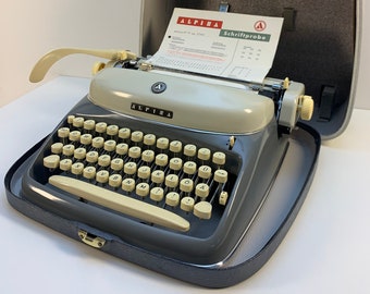 1961 Unveiling Elegance: The Untouched Alpina SK24 Typewriter" A Collector's Dream in New Condition"