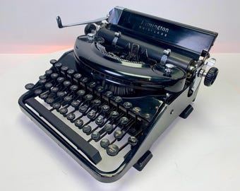 Remington Noiseless Model 7 – 1948 – Gloss Black Art Deco Design