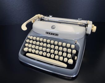 Untouched Alpina SK24 Typewriter, Year 1961, No. 273096, QWERTZ, Mint 5 Star condition, With Case, Manual and Certificate