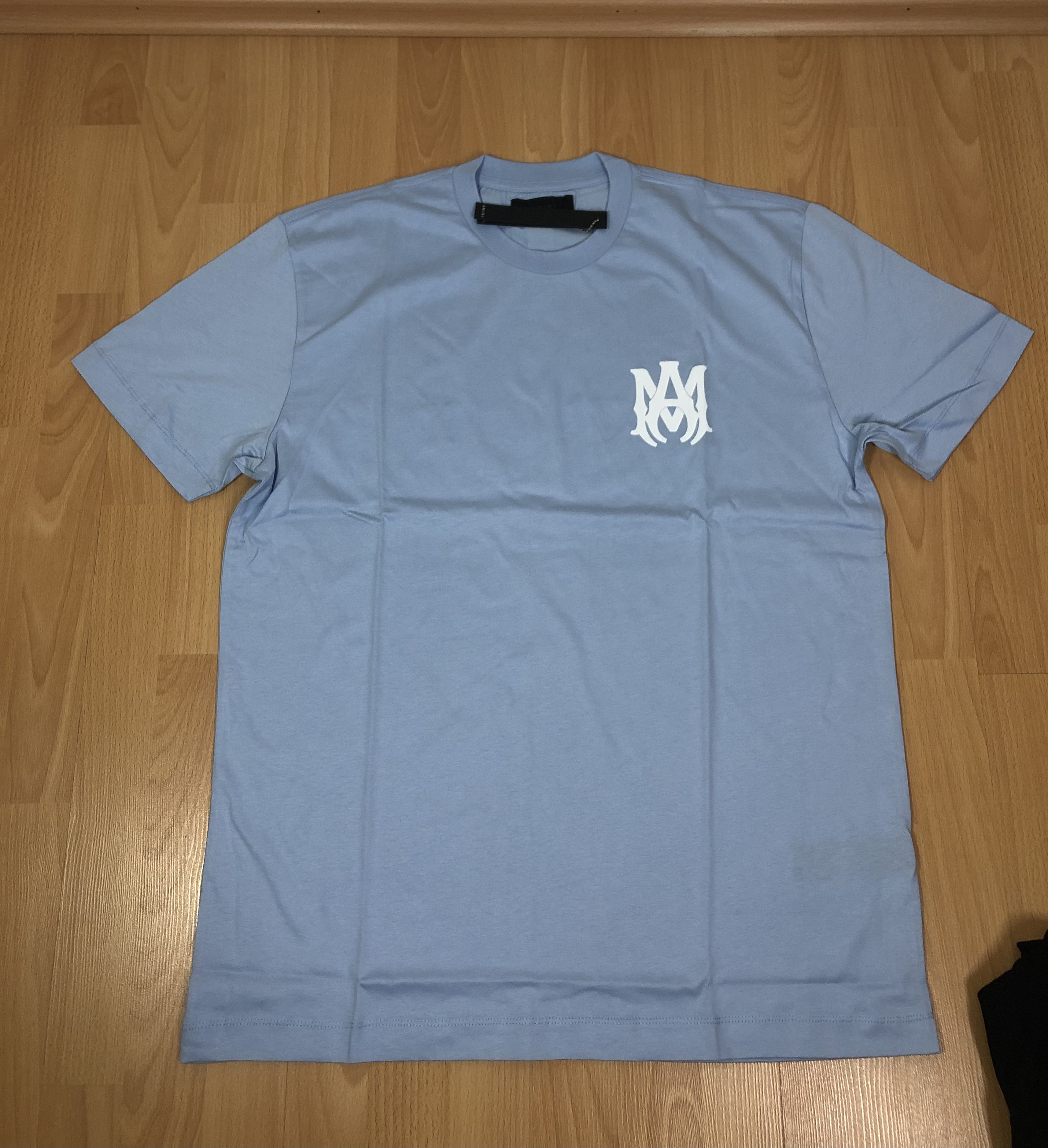 white amiri shirt