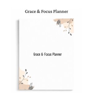 May include: A white planner cover titled Grace & Focus Planner in black text. The design features abstract beige shapes in the top right and bottom left corners, accented with delicate dark gray botanical illustrations of leaves and stems.