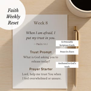 May include: A weekly faith reset card with the text "Week 8" and a Bible verse. The card includes prompts for reflection and a prayer starter. A gold pen and a cup of coffee are also in the image.
