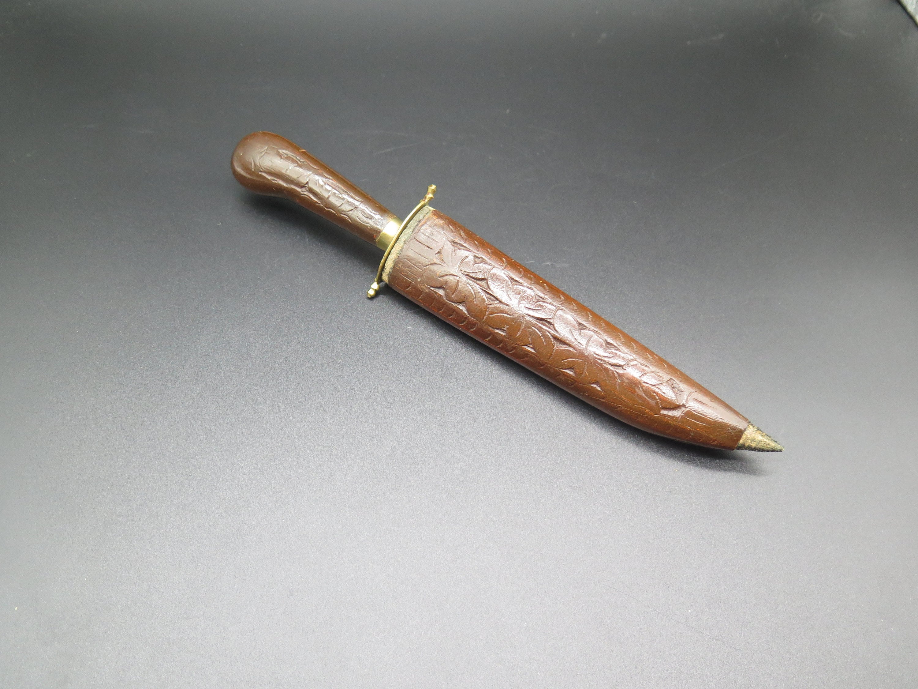 Vintage Knife Made in India. the Sheath and Handle is in Vintage Knife Made in India. the Sheath and Handle is in