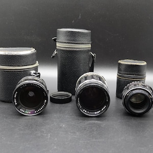 Set of 3 Vintage 35mm Camera Lens. The SOLIGOR Wide-Auto 28 mm, Soligor Tele-Auto 135 mm and Super-Takumar 55 mm F1.8 Standard Lens