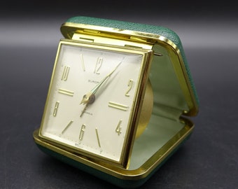 Vintage EUROPA 2 Jewels Germany Travel Alarm Clock in Green Case. The Clock and Alarm is working Made in Germany in the 60-70s