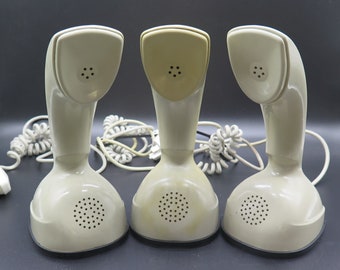 Klasyczny SZARY Ericsson ERICOFON, lepiej znany jako „telefon COBRA”, 21 cm wysokości, lata 1962–1982. Telefon wyprodukowany w Szwecji przez firmę Ericsson.