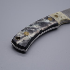 Vintage Knife with Hand Made Handle. The Beautiful Handle is in Mother-of-Pearl and Stone or Komposit Stone Collectors knife from the 80-90s