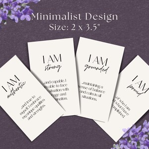 May include: Four white cards with black text. Each card features the phrase "I AM" followed by a different word: "authentic", "strong", "grounded", and "proud". Each card also includes a short phrase describing the word.