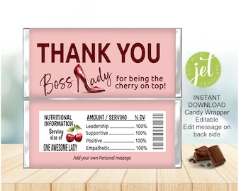 May include: A pink candy bar wrapper featuring the text THANK YOU Boss Lady for being the cherry on top with a red high heel shoe illustration. The back includes a nutritional label listing leadership, supportive, positive, and empathetic traits.