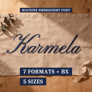 May include: A machine embroidery font design featuring the name Karmela in dark blue cursive script on a light brown fabric background. The image includes text labels stating MACHINE EMBROIDERY FONT, 7 FORMATS + BX, and 5 SIZES.