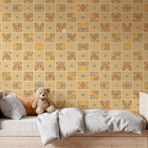 May include: A bedroom scene featuring a bed with white bedding, pillows, and a teddy bear. The wall behind the bed is covered in a repeating geometric pattern in yellow, orange, and black.
