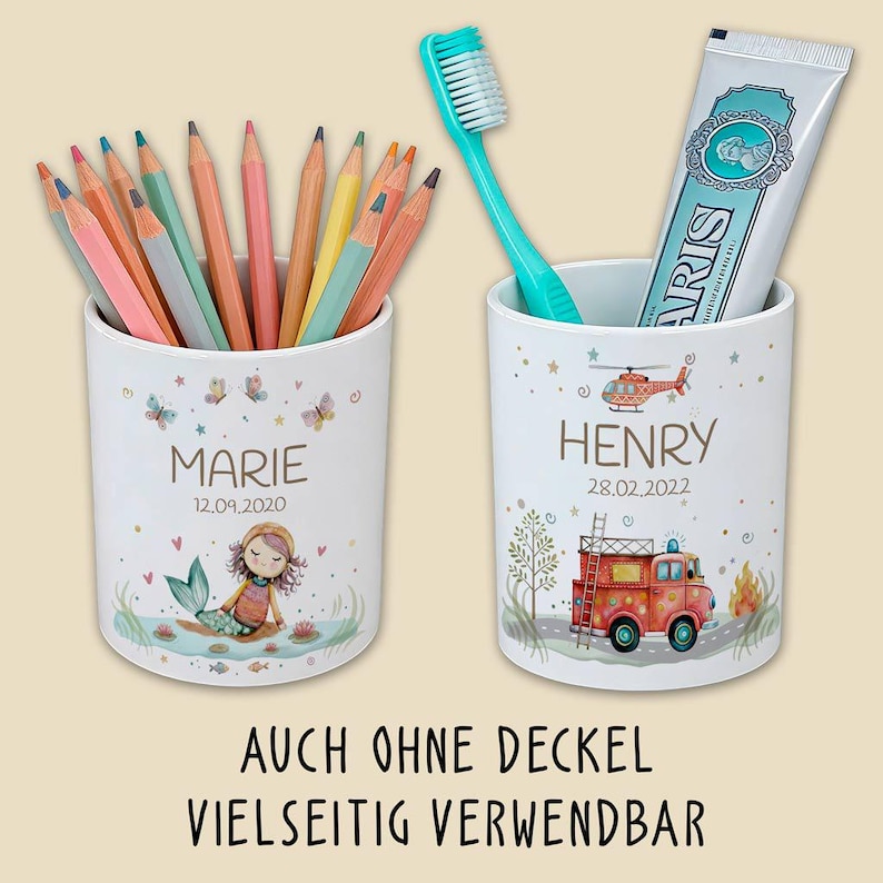 May include: Two white ceramic holders, one with colored pencils and the other with a toothbrush and toothpaste. The first holder has a mermaid illustration and the name "MARIE". The second holder has a fire truck illustration and the name "HENRY".