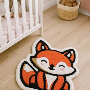 Hand-tufted fox rug in cozy nursery with wooden crib – woodland decor for baby room