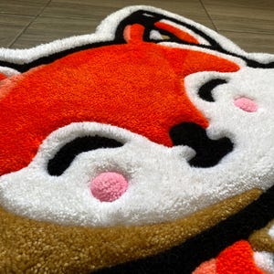 Smiling fox rug detail – hand-tufted nursery rug for animal lovers