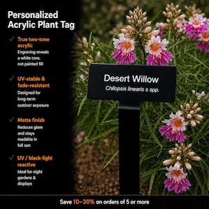 May include: A black rectangular acrylic plant tag with a stake, featuring the white engraved text Desert Willow and Chilopsis linearis s spp. The tag is displayed next to text listing features like two-tone acrylic and UV-stable properties.
