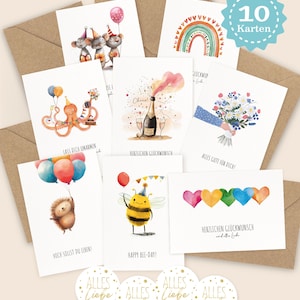 May include: A set of ten greeting cards with various watercolor illustrations, including animals, rainbows, and champagne. The cards are accompanied by brown envelopes and round stickers with gold text. The cards have German text.