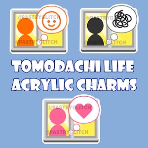 May include: Three acrylic charms featuring a gray frame with a yellow background. Each charm has a different image inside the frame. The first charm has an orange person with a smiling face in a thought bubble. The second charm has a black person with a tangled thought bubble. The third charm has a pink person with a heart in a thought bubble. The text "TOMODACHI LIFE ACRYLIC CHARMS" is below the charms.