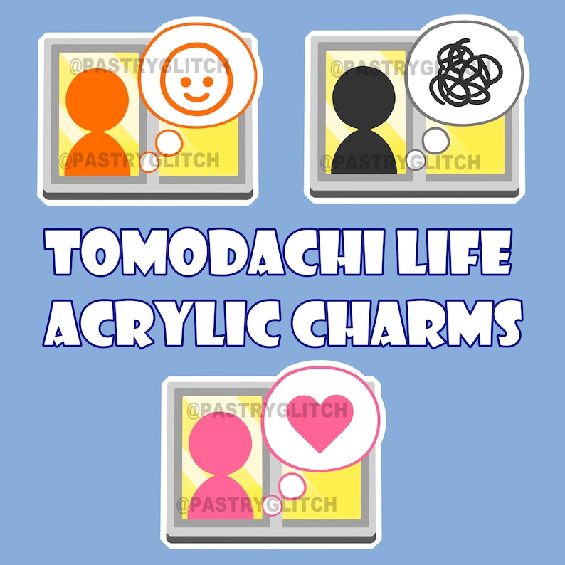May include: Three acrylic charms featuring a gray frame with a yellow background. Each charm has a different image inside the frame. The first charm has an orange person with a smiling face in a thought bubble. The second charm has a black person with a tangled thought bubble. The third charm has a pink person with a heart in a thought bubble. The text "TOMODACHI LIFE ACRYLIC CHARMS" is below the charms.