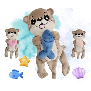 May include: Three plush otter toys. One otter is holding a blue fish, another is holding a pink heart, and the third is holding a peach-colored heart. The otters are brown with black eyes and noses. The background is a watercolor-style painting of blue and white.