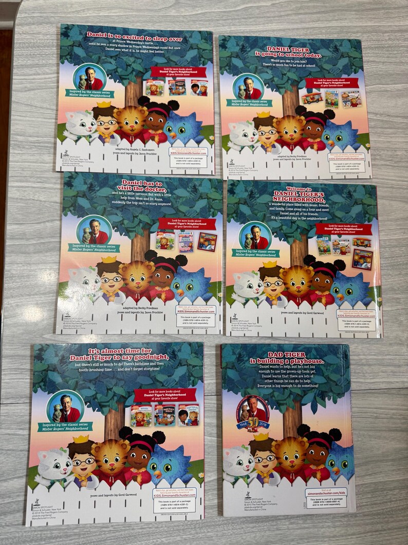 K&ouml;nnte beinhalten: Sechs Kinderb&uuml;cher mit Daniel Tiger-Charakteren. Jedes Buchcover zeigt ein Cartoon-Bild von Daniel Tiger und seinen Freunden, mit Text wie "Daniel freut sich auf die &Uuml;bernachtung" und "Daniel Tigers Nachbarschaft."