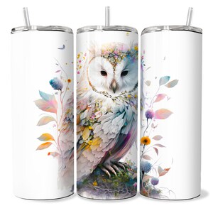 May include: Three white stainless steel tumblers with lids and straws. The center tumbler features a colorful illustration of an owl with flowers and leaves.