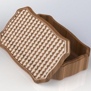 May include: A wooden box with a hinged lid. The lid features a decorative pattern of squares and rectangles. The box is made from light brown wood.