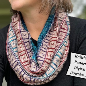 May include: A knitted cowl with a multi-colored striped pattern in shades of teal, purple, red, and beige. The cowl is worn by a person and the text "Knitting Pattern Digital Download" is visible in the lower right corner of the image.