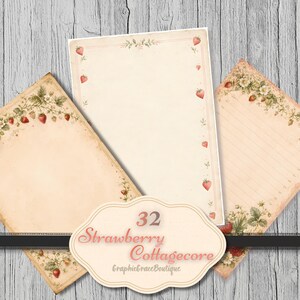 May include: A set of vintage-style stationery featuring strawberries and floral motifs. The stationery includes lined and unlined paper with a cream background and decorative borders. A label with the text "Strawberry Cottagecore" is also visible in the image.