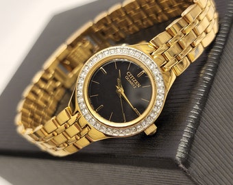 Vintage dames gouden horloge Citizen Quartz met zwarte wijzerplaat en stenen korst wijzerplaat cadeau voor haar