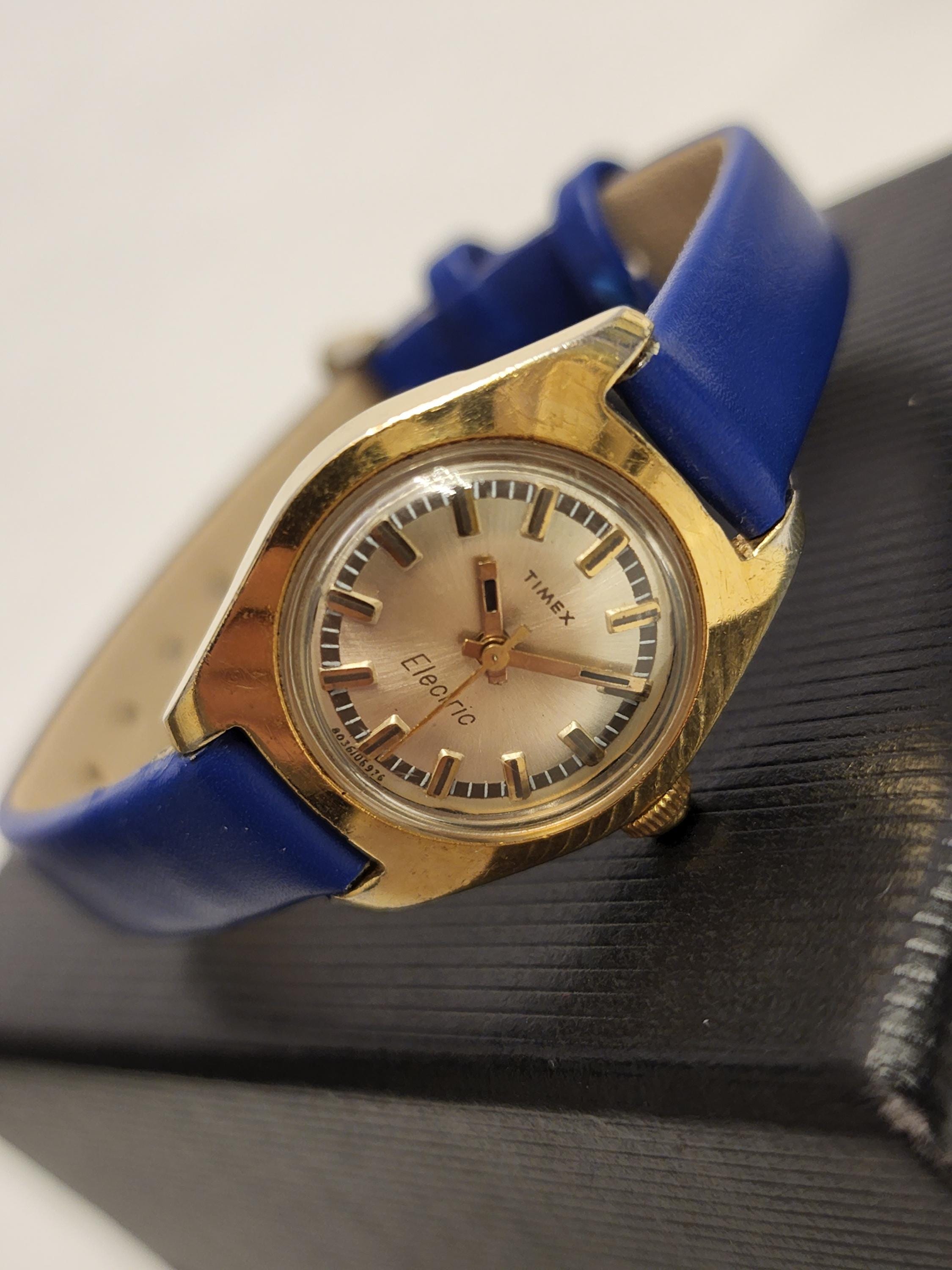 Vintage Womens Watch Gold Tone Timex Electric 1976 on Blue 