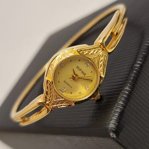 Vintage Womens Watch Gold Tone Rofina Quartz Bangle Watch  display picture 1