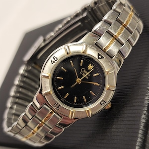 Retro Two Tone Womens Watch Caravelle By Bulova Quartz Silver Tone With Gold Tone Trim And Black Dial Small Womens Watch Gift For Her