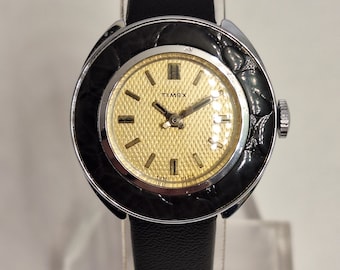 1975 Timex Womens Manual Wind Watch With Champagne Dial On Black Leather Strap Gift For Her