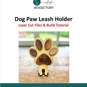 May include: Wooden dog paw leash holder with a hook. The paw print is made of different colored wood and has the name "VILLA" engraved on it. Laser cut files and build tutorial.
