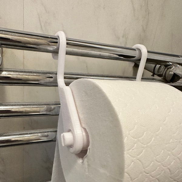Towel rail toilet roll holder
