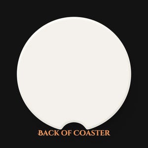 May include: White ceramic coaster with a cutout for a beverage. The back of the coaster is blank.