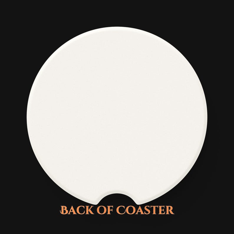 May include: White ceramic coaster with a cutout for a beverage. The back of the coaster is blank.