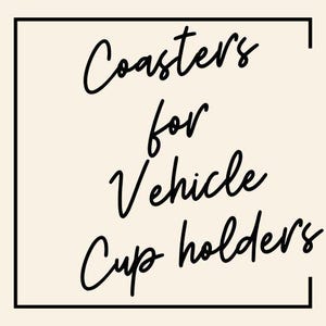 May include: Black and white text on a beige background within a black square frame. The text reads "Coasters for Vehicle Cup Holders".