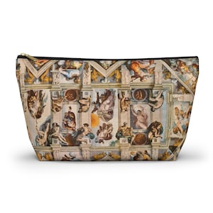 May include: A zippered pouch featuring a detailed print of Michelangelo's Sistine Chapel ceiling. The artwork depicts various figures in shades of beige, brown, and blue, with a black zipper and trim.