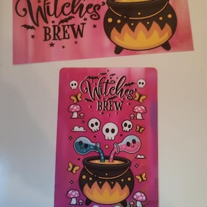 May include: Two rectangular cards featuring a pink background with a black cauldron pouring blue and pink liquids. The text reads Witches Brew, Each Icon Total, and Cashstuff with Jazz. The design includes skulls, mushrooms, bats, and yellow butterflies.
