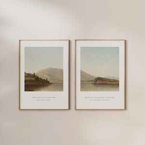 May include: Two framed landscape prints with gold frames. Each print shows a tranquil lake scene with mountains and trees. The prints have text at the bottom: "THEY ARE NO LONGER TWO BUT ONE FLESH" and "WHAT GOD HAS JOINED TOGETHER, LET NO ONE SEPARATE."