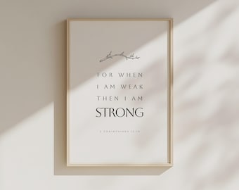 May include: Framed print with the text "FOR WHEN I AM WEAK THEN I AM STRONG" in a minimalist design. The print features a light beige background, black text, and a simple branch illustration at the top. The Bible verse 2 Corinthians 12:10 is at the bottom.