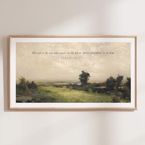 May include: A framed print with a landscape painting of a field with trees and a cloudy sky. The print includes the text "Blessed is the one who trusts in the Lord, whose confidence is in him. Jeremiah 17:7"