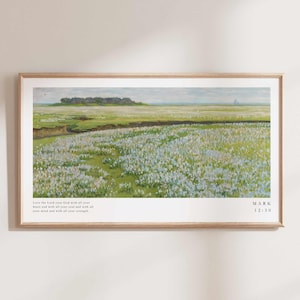 May include: A framed print of a landscape painting featuring a field of blue wildflowers with a distant view of a small island. The print includes a quote from the Bible: "Love the Lord your God with all your heart and with all your soul and with all your mind and with all your strength."  The quote is attributed to Mark 12:30.