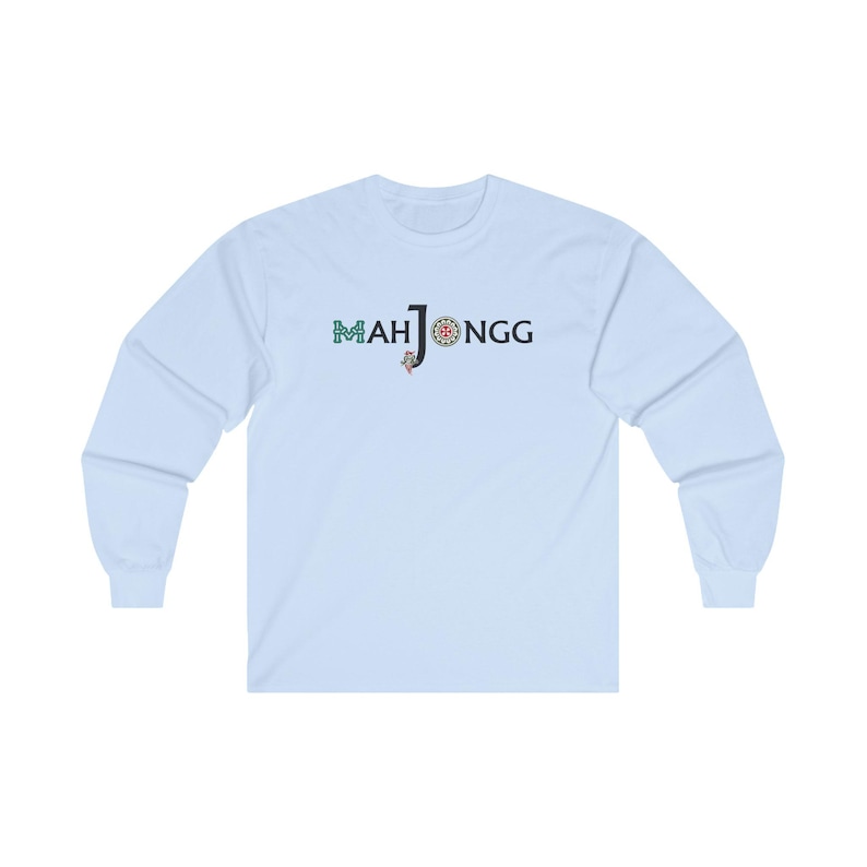 May include: A light blue long-sleeved t-shirt with the text "MAHJONGG" printed in black and green on the front.
